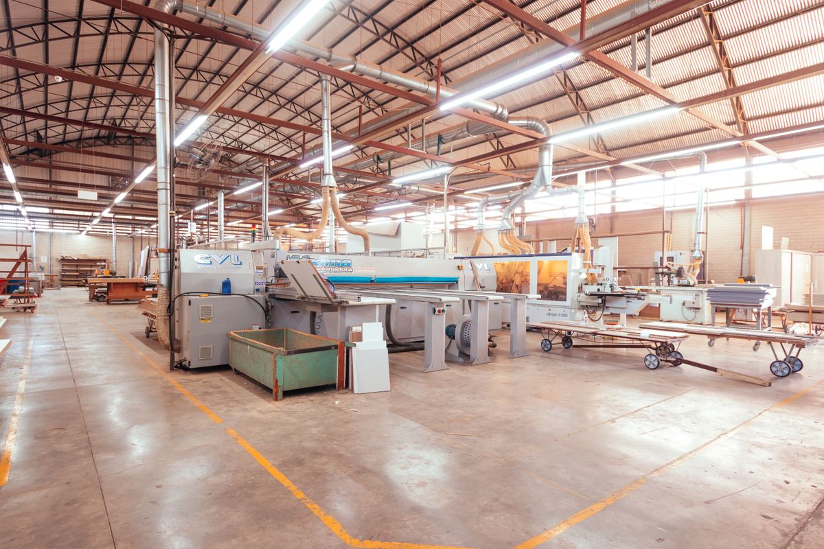 Modern woodworking factory with panel processing machinery